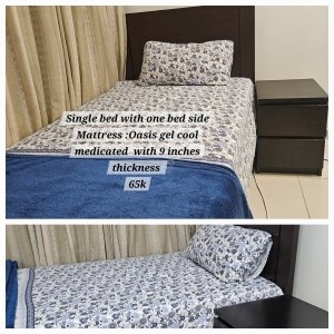 Single bed with mattress and side table