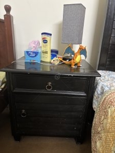 Polished double bed with side tables and dressing table